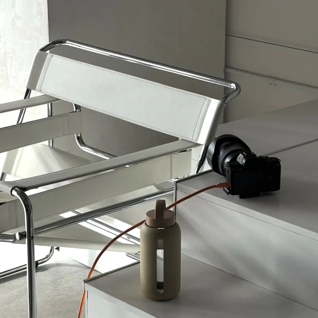 SZE product beside a chair
